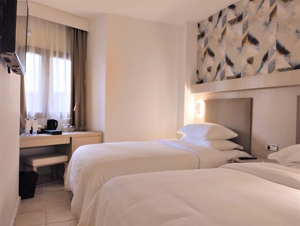 Imagen de la habitación del Hotel Ona Hacienda del Alamo Golf Resort. Foto 10