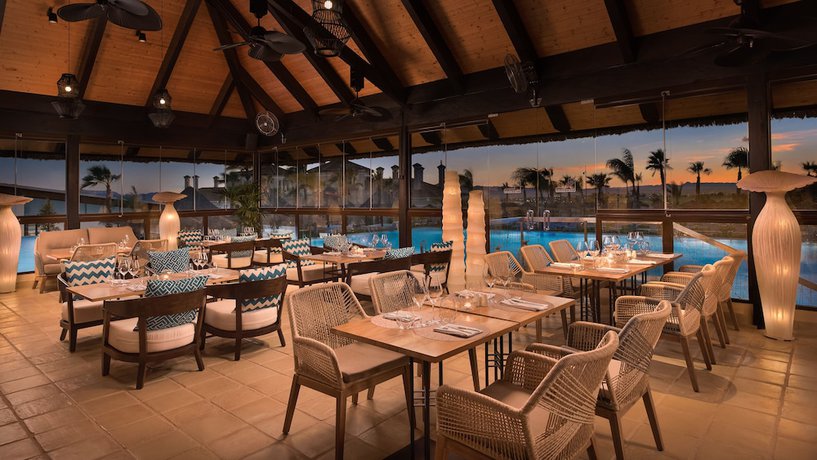 Imagen del bar/restaurante del Hotel Ona Hacienda del Alamo Golf Resort. Foto 4