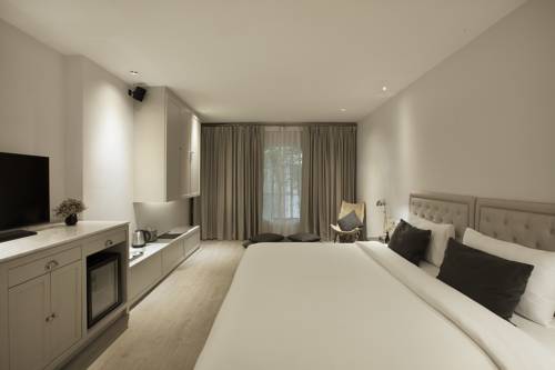 Imagen de la habitación del Hotel Once Bangkok. Foto 15