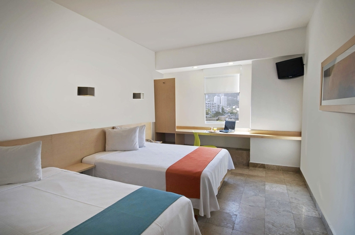 Imagen de la habitación del Hotel One Acapulco Costera. Foto 4