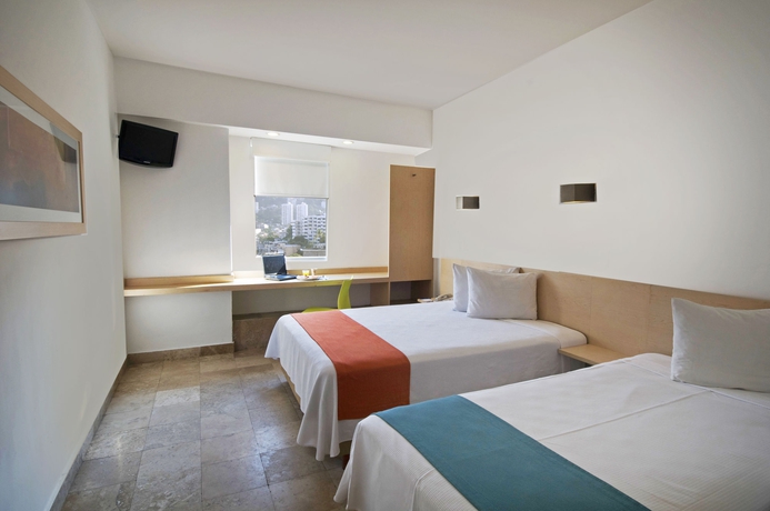 Imagen de la habitación del Hotel One Acapulco Costera. Foto 6