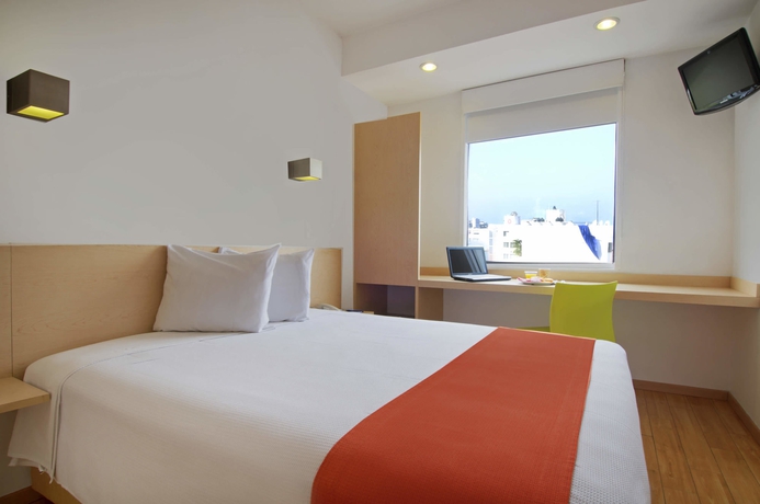 Imagen de la habitación del Hotel One Acapulco Costera. Foto 8