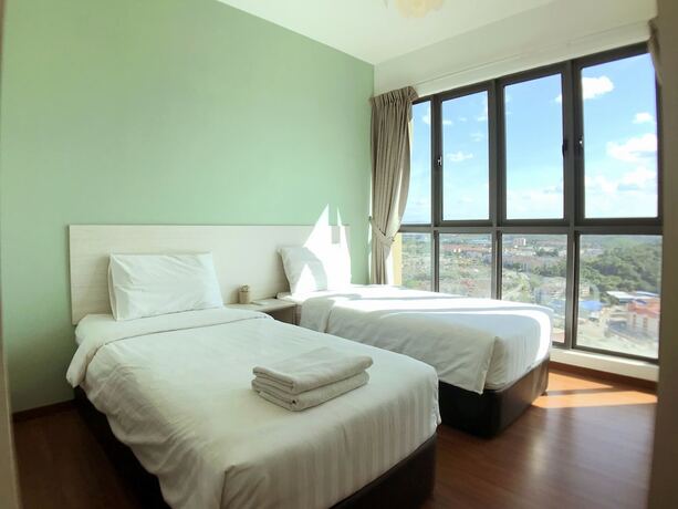 Imagen de la habitación del Hotel One Amerin Mall and Suites. Foto 14