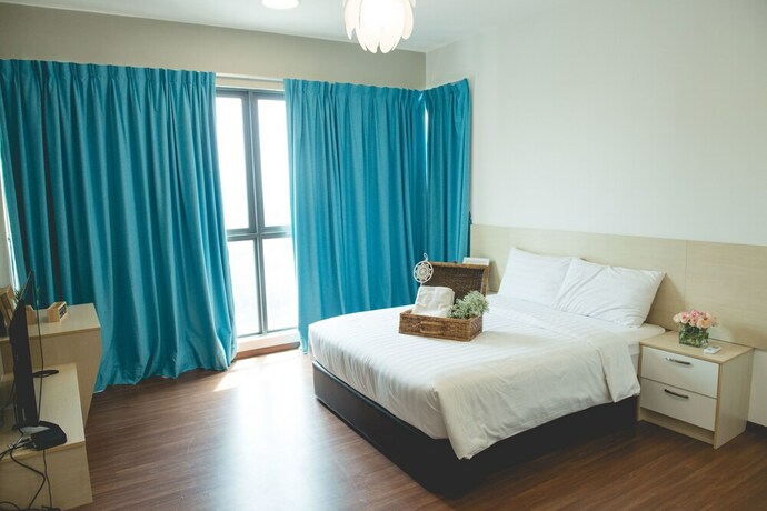 Imagen de la habitación del Hotel One Amerin Mall and Suites. Foto 15