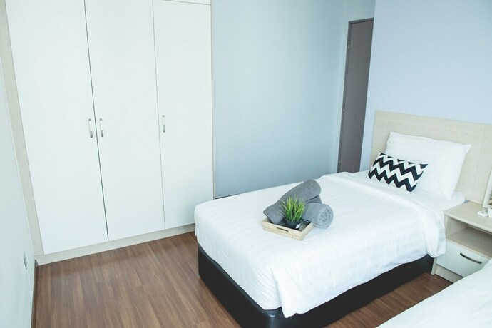 Imagen de la habitación del Hotel One Amerin Mall and Suites. Foto 16