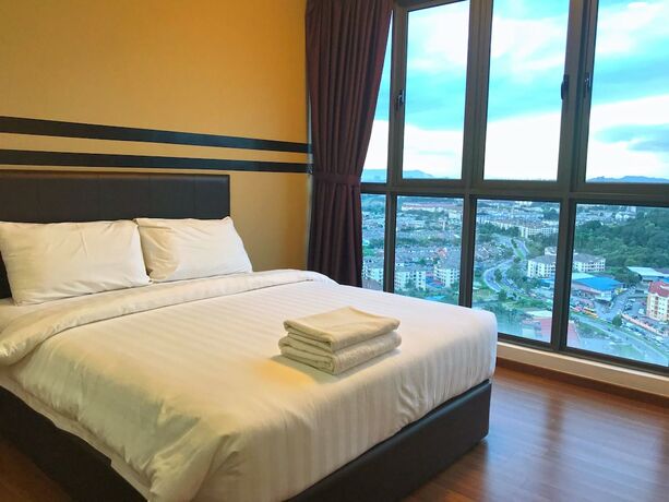 Imagen de la habitación del Hotel One Amerin Mall and Suites. Foto 18