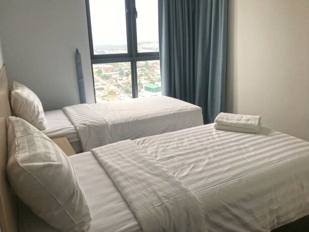 Imagen de la habitación del Hotel One Amerin Mall and Suites. Foto 21