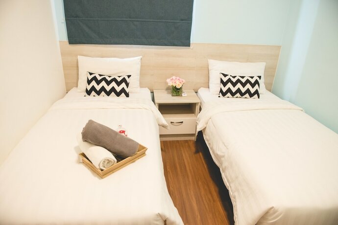 Imagen de la habitación del Hotel One Amerin Mall and Suites. Foto 23