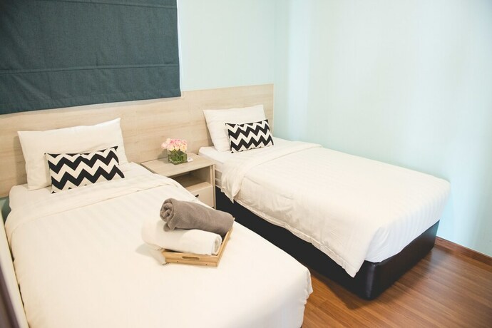 Imagen de la habitación del Hotel One Amerin Mall and Suites. Foto 28