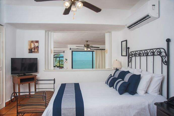 Imagen de la habitación del Hotel One Beach Street Puerto Vallarta. Foto 11