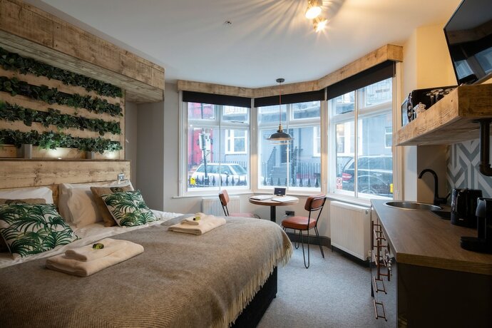 Imagen de la habitación del Hotel One Broad Street. Foto 18