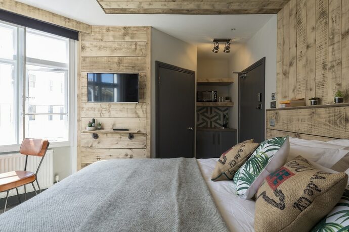 Imagen de la habitación del Hotel One Broad Street. Foto 19