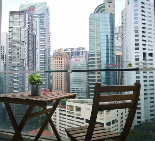 Imagen de la habitación del Hotel One Bukit Celyon By Homes Asian. Foto 11