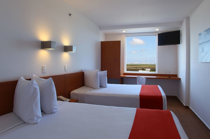 Imagen de la habitación del Hotel One Cancun Centro. Foto 7