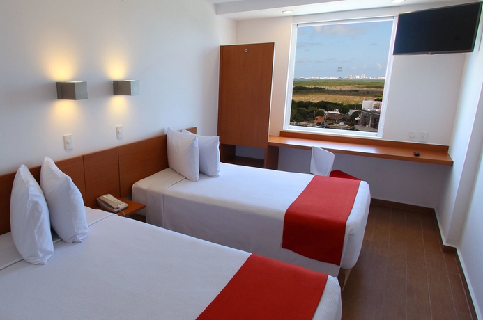 Imagen de la habitación del Hotel One Cancun Centro. Foto 8