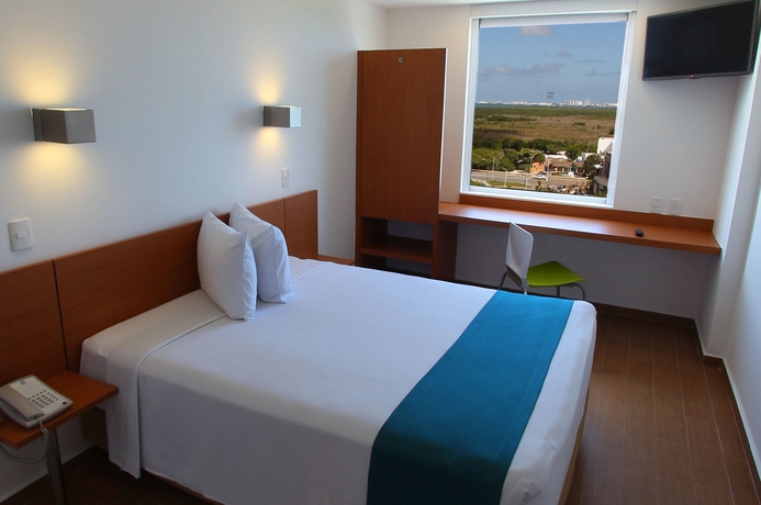 Imagen de la habitación del Hotel One Cancun Centro. Foto 9