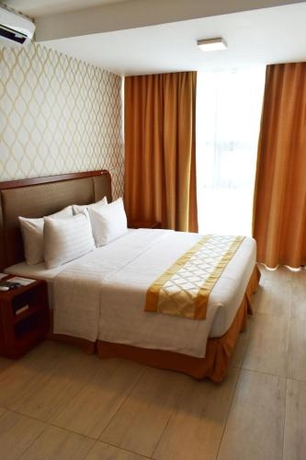 Imagen de la habitación del Hotel One Central. Foto 10