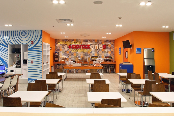 Imagen del bar/restaurante del Hotel One Ciudad De México Periférico Sur. Foto 4