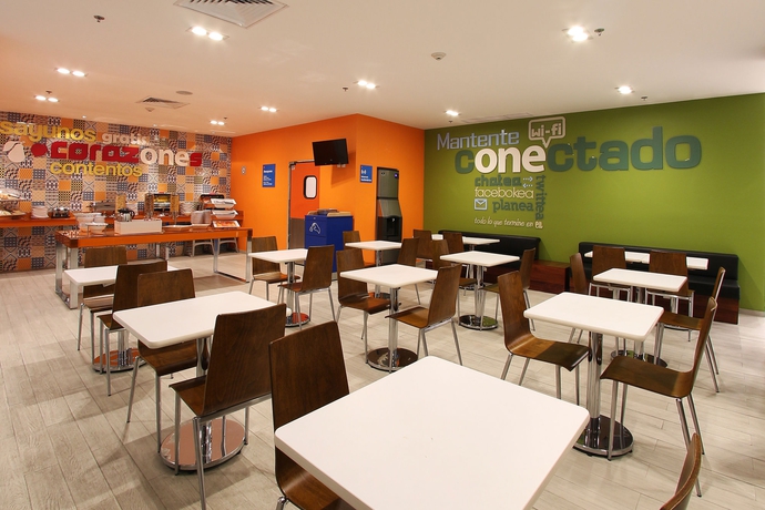 Imagen del bar/restaurante del Hotel One Ciudad De México Periférico Sur. Foto 5