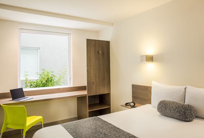 Imagen de la habitación del Hotel One Ciudad de Mexico La Raza. Foto 12