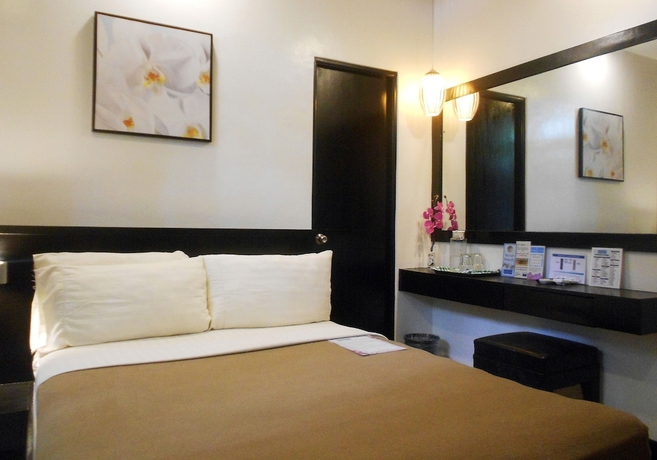 Imagen de la habitación del Hotel One Crescent Place. Foto 6