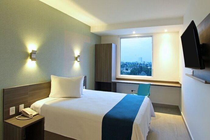 Imagen de la habitación del Hotel One Cuautitlan. Foto 23