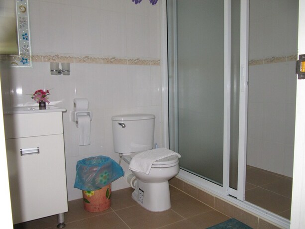 Imagen de la habitación del Hotel One D Homestay. Foto 17