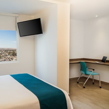 Imagen de la habitación del Hotel One Durango. Foto 17