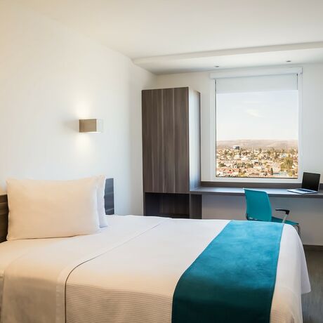 Imagen de la habitación del Hotel One Durango. Foto 19