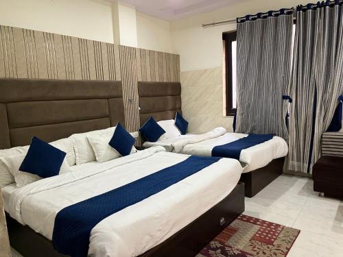Imagen de la habitación del Hotel One Earth City Pearl Amritsar. Foto 20