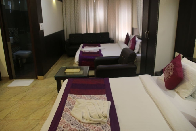 Imagen de la habitación del Hotel One Earth GG Regency. Foto 4