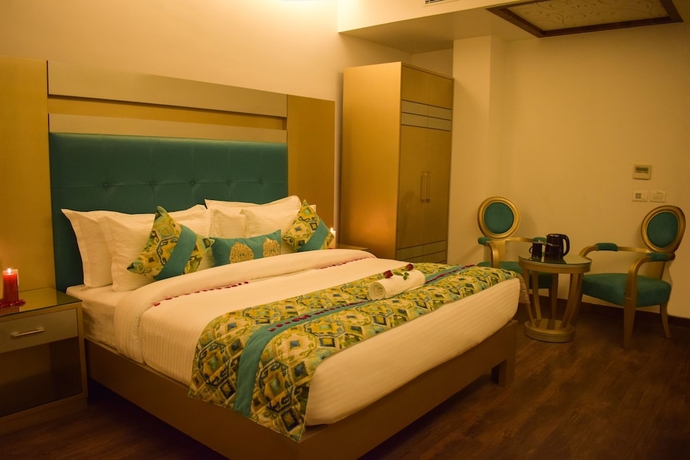 Imagen de la habitación del Hotel One Earth GG Regency. Foto 7