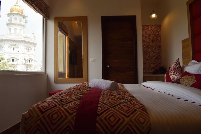 Imagen de la habitación del Hotel One Earth GG Regency. Foto 9