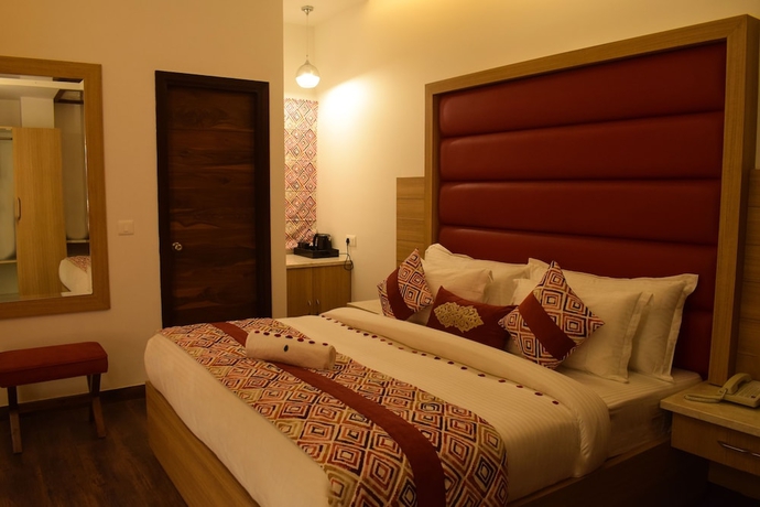 Imagen de la habitación del Hotel One Earth GG Regency. Foto 10