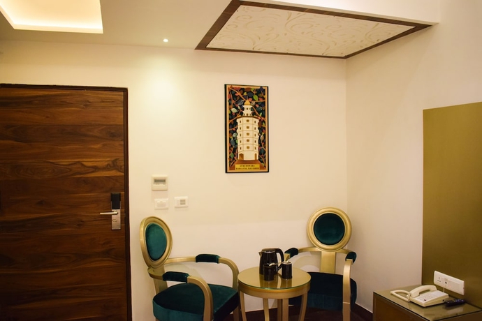 Imagen de la habitación del Hotel One Earth GG Regency. Foto 11