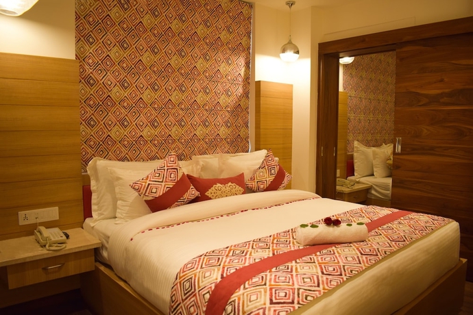 Imagen de la habitación del Hotel One Earth GG Regency. Foto 13