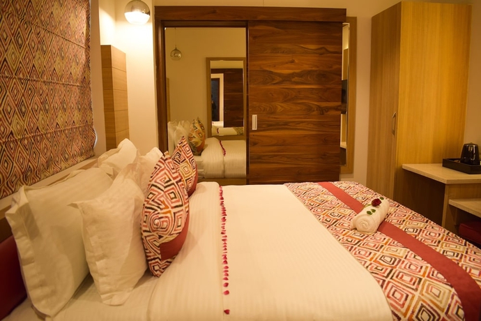 Imagen de la habitación del Hotel One Earth GG Regency. Foto 14