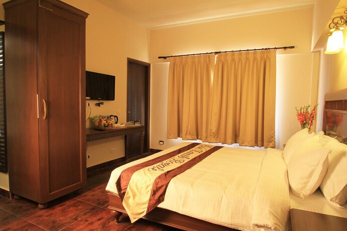 Imagen de la habitación del Hotel One Earth Royale Boutique. Foto 18