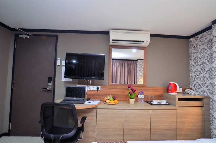 Imagen de la habitación del Hotel One Enigma. Foto 5
