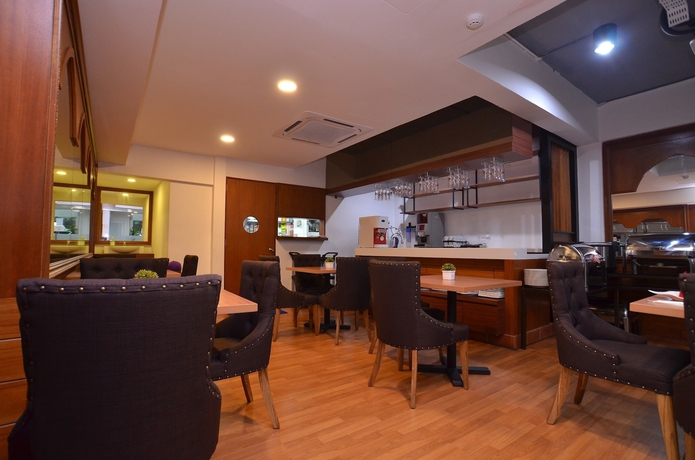 Imagen del bar/restaurante del Hotel One Enigma. Foto 2