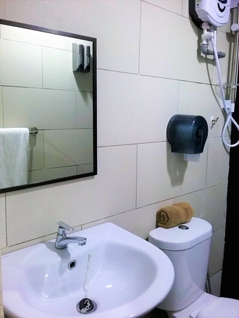 Imagen de la habitación del Hotel One Enigma. Foto 8