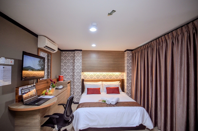 Imagen de la habitación del Hotel One Enigma. Foto 11