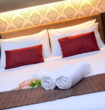 Imagen de la habitación del Hotel One Enigma. Foto 12