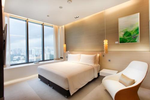 Imagen de la habitación del Hotel One Farrer. Foto 4