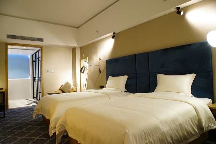 Imagen de la habitación del Hotel One Flight Apartment Bao'an Branch. Foto 7