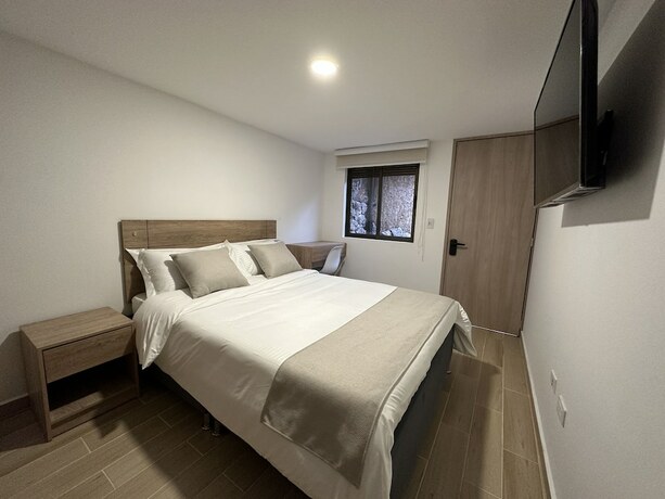 Imagen de la habitación del Hotel One Fourteen Rooms. Foto 17