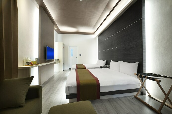 Imagen de la habitación del Hotel One Fukun. Foto 17