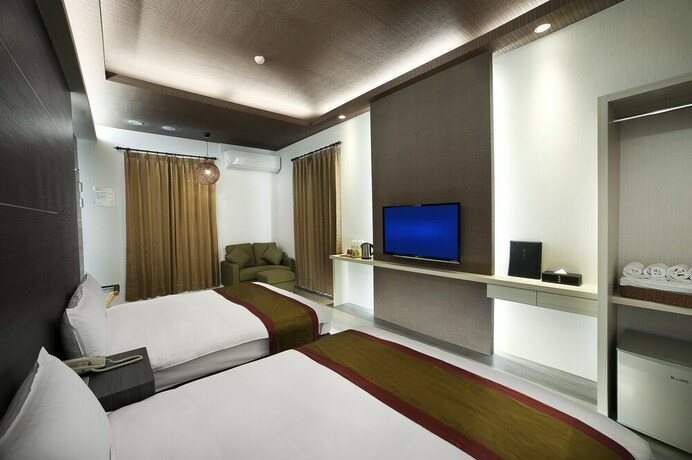 Imagen de la habitación del Hotel One Fukun. Foto 19