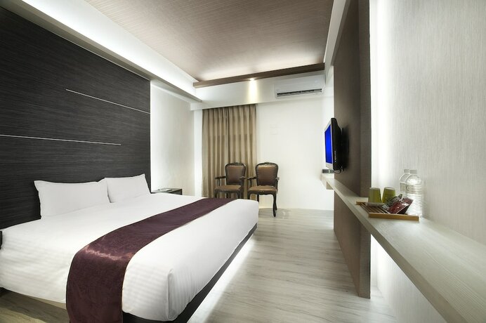 Imagen de la habitación del Hotel One Fukun. Foto 20