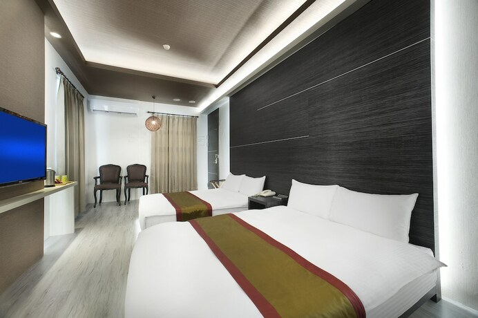 Imagen de la habitación del Hotel One Fukun. Foto 24